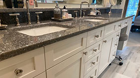 custom bathroom counter & cabinets